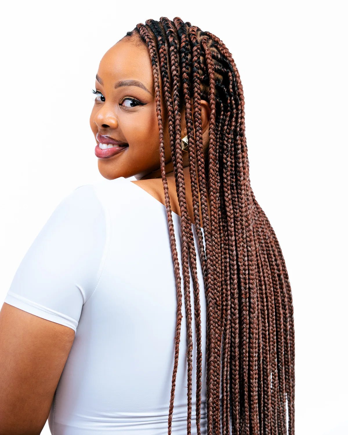 Model wearing PANKINA [350/30/33/613] - 52 Inch Pre-Stretched Braiding Hair (26" Braided)